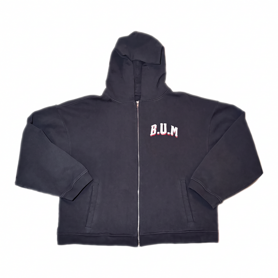 B.U.M. Zip-Up Hoodie in washed charcoal laid flat, front view with the arched B.U.M. logo on the left chest and a full-length zip